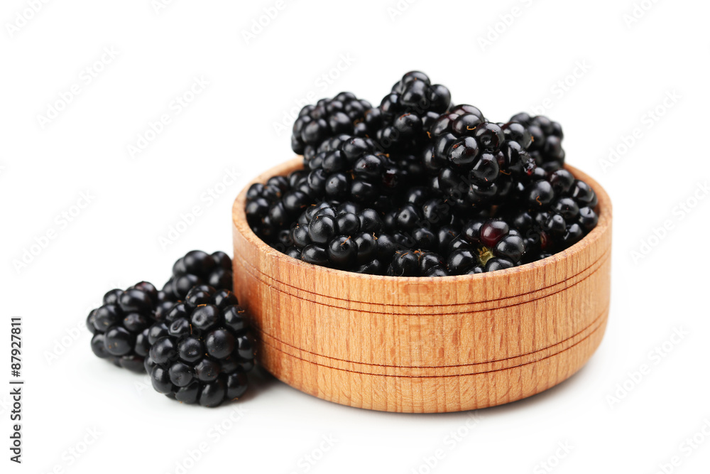 Beautiful ripe blackberry in bowl on white background Beautiful ripe blackberry in bowl on white background