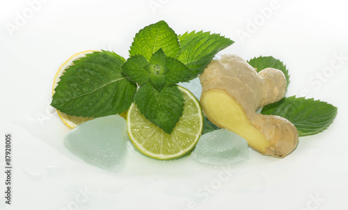 lime slice with mint leaves and ice cubes isolated