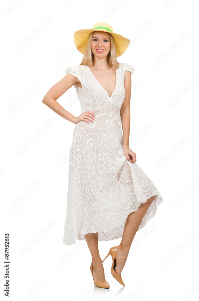 Woman in long summer dress and hat isolated on white