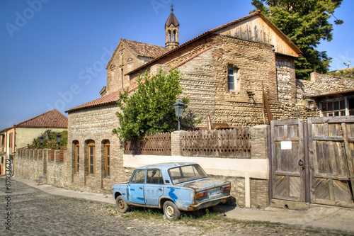 old car by a house in Sighnaghi, Georgia
 photo