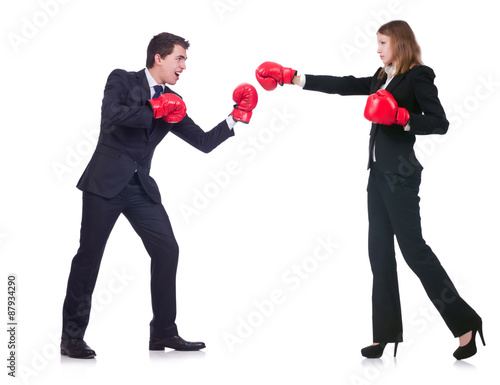 Two business partners boxing isolated on white