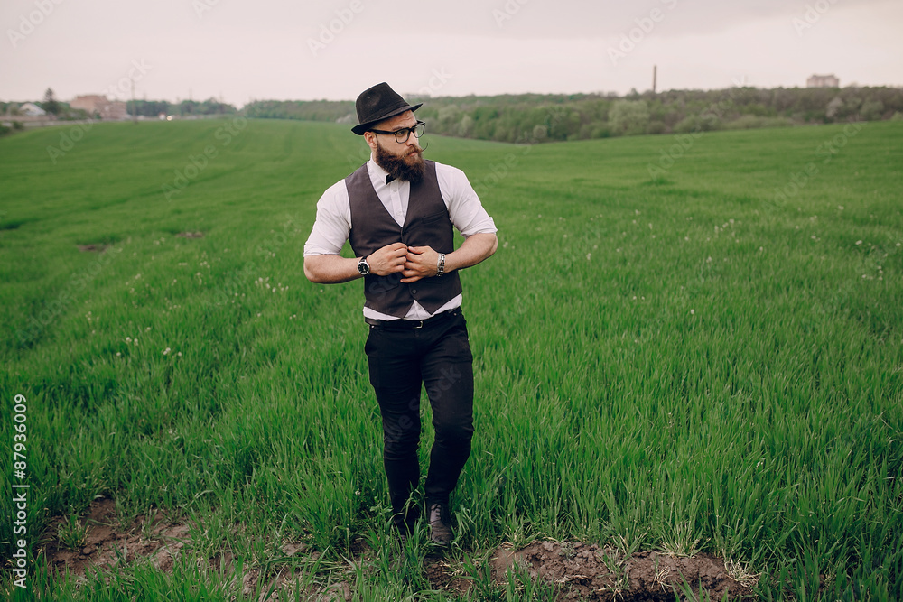 beard man in field lonley beard man in field lonley