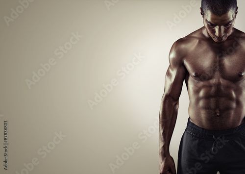 Sport. Close up image of muscular african male in sports clothing 
