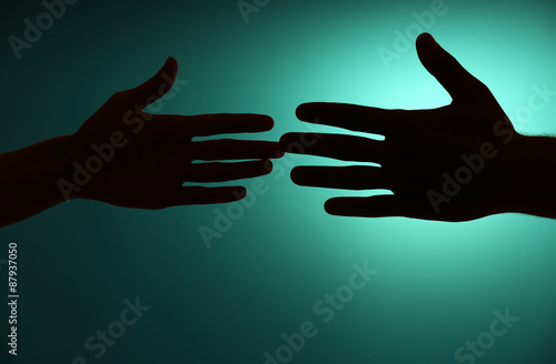 Silhouette of hands close up