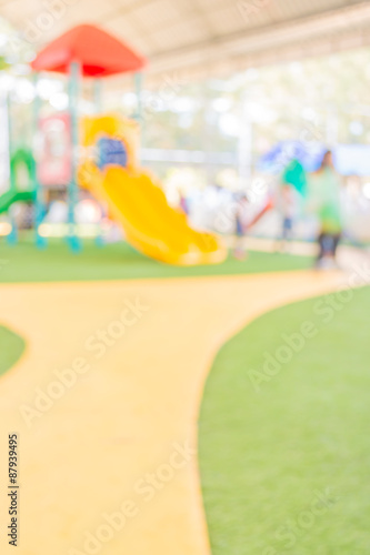  blur image of children's playground at public park .