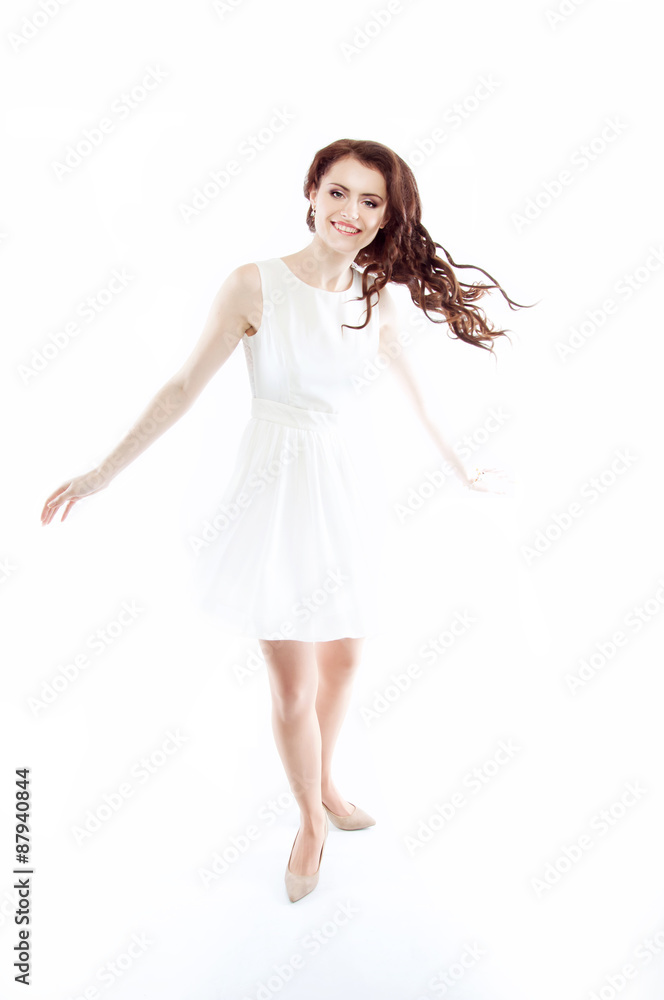 Studio portrait of a beautiful redheaded woman with evening hair Studio portrait of a beautiful redheaded woman with evening hair
