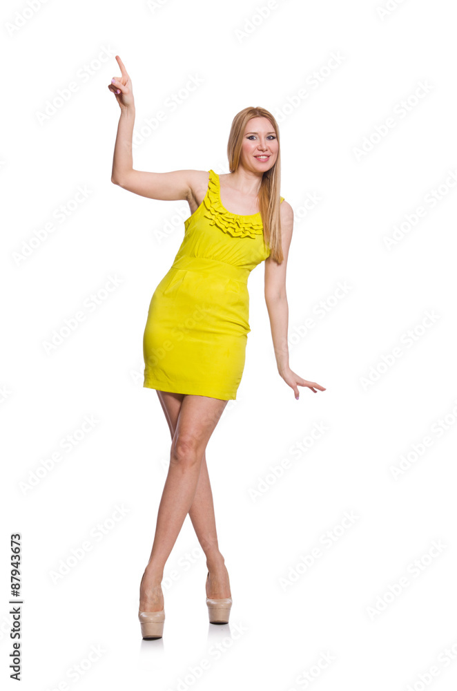 Pretty tall woman in short yellow dress isolated on white Pretty tall woman in short yellow dress isolated on white