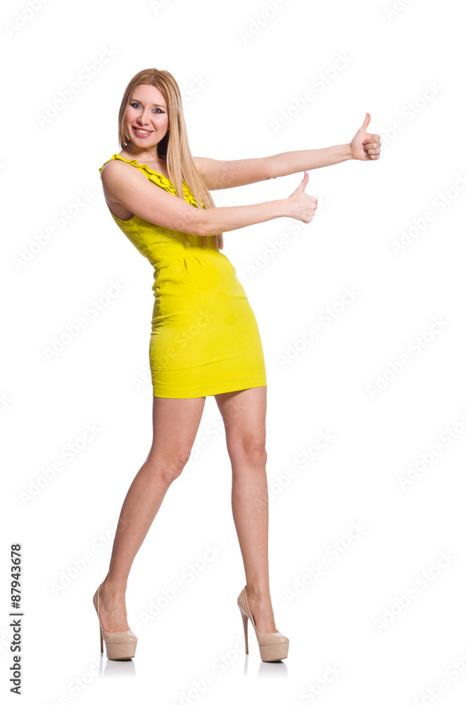 Pretty tall woman in short yellow dress isolated on white Pretty tall woman in short yellow dress isolated on white