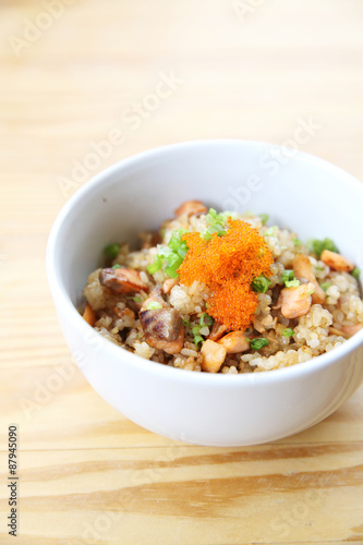 Japanese Salmon fried rice on wood background