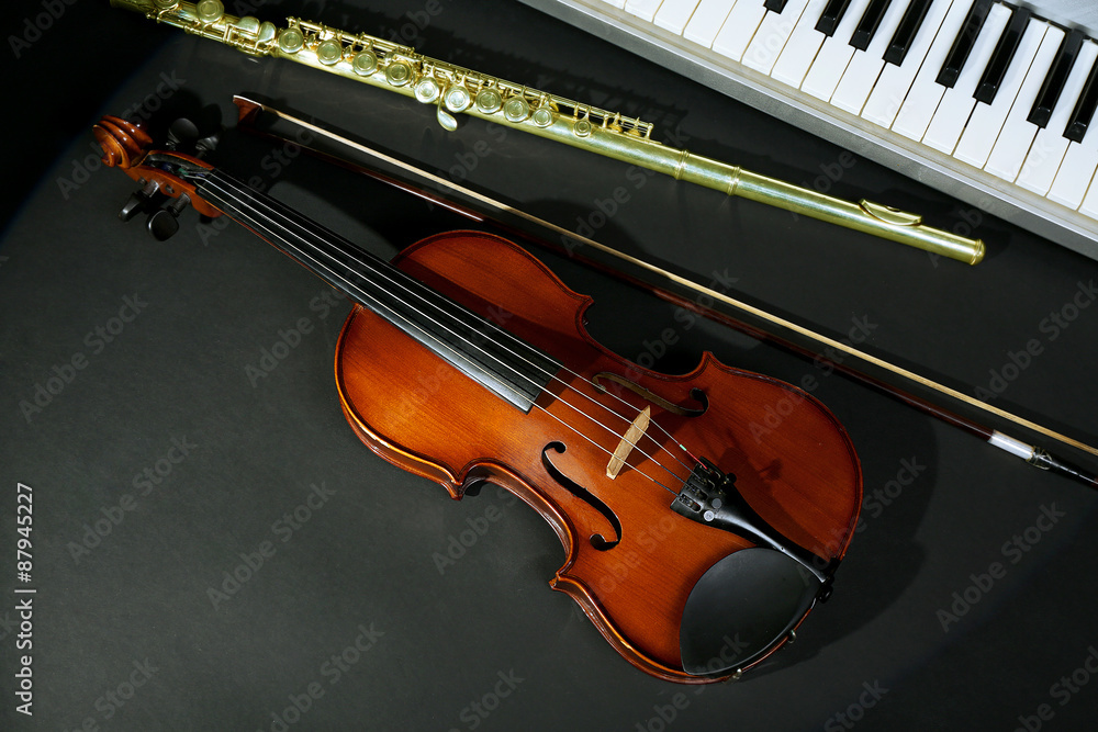 Musical instruments on dark background Musical instruments on dark background