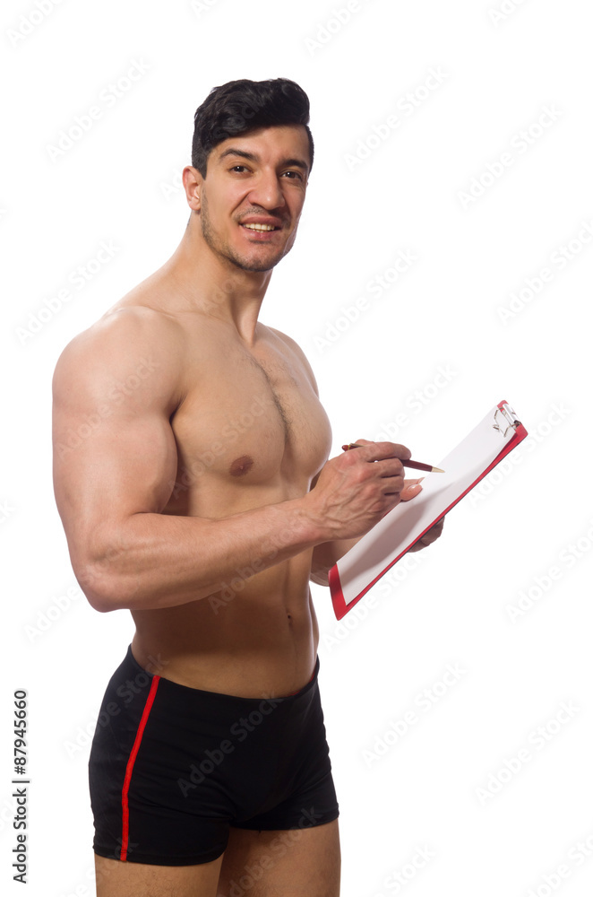Fototapeta premium Muscular man with blank pad for your message