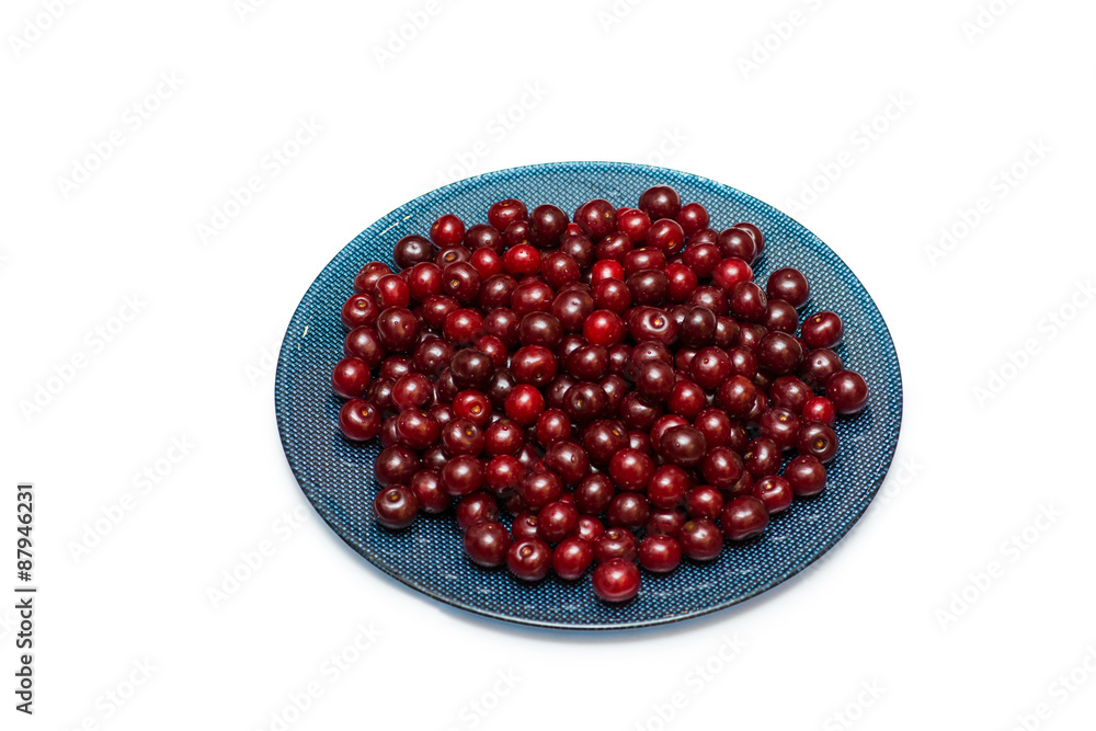 Plate full of cherries isolated on white Plate full of cherries isolated on white