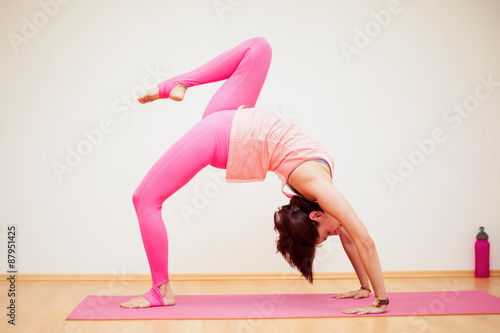 Backbend with raised leg yoga pose