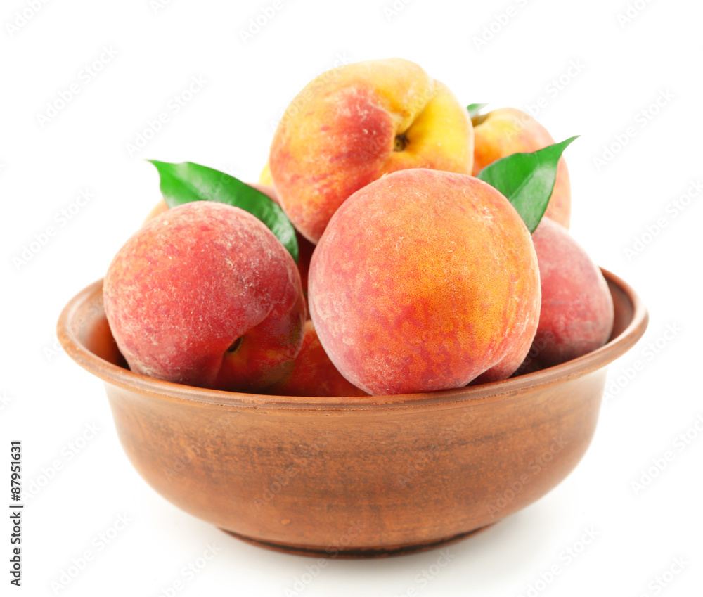 Ripe peaches in bowl isolated on white Ripe peaches in bowl isolated on white
