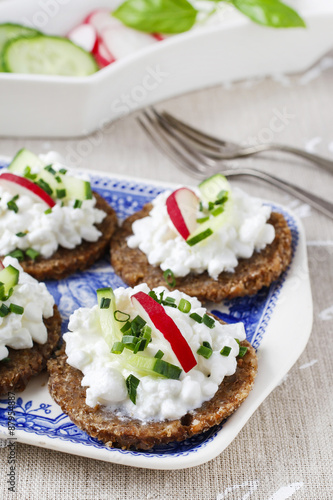 Fresh bread with cottage cheese and vegetables