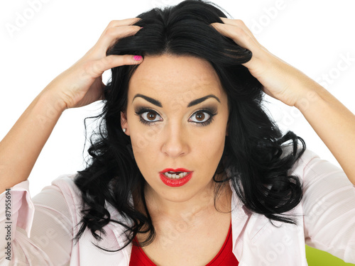 Portrait of an Angry Frustrated Young Hispanic Woman Pulling Her Hair