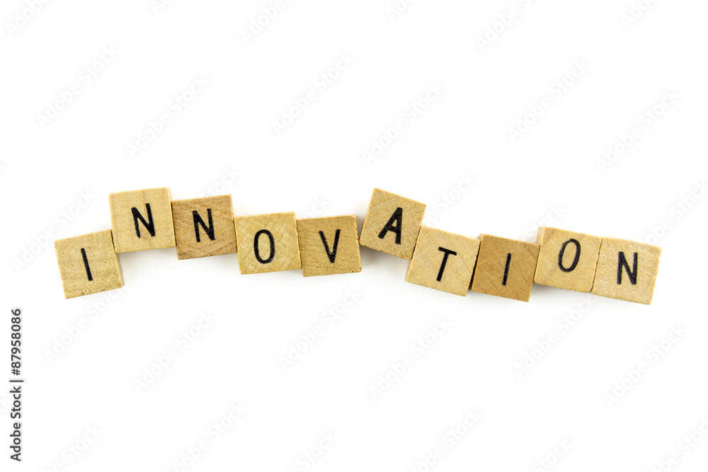 Innovation text on wooden cubes, isolated on white background Innovation text on wooden cubes, isolated on white background
