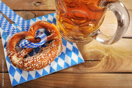 Bayerische Oktoberfestbreze mit Bier photo