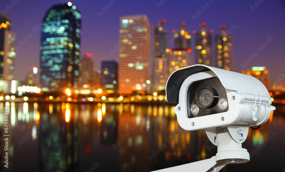 CCTV camera with Blurring City in night background.