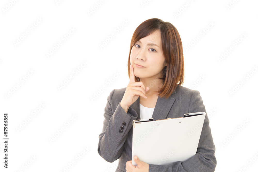 困惑した表情のビジネスウーマン 困惑した表情のビジネスウーマン
