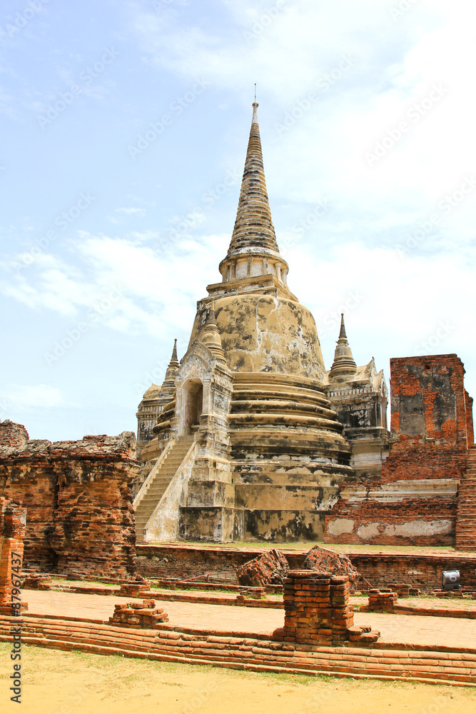 Ancient Buddhist pagoda ruins at Wat Phra Sri Sanphet temple.