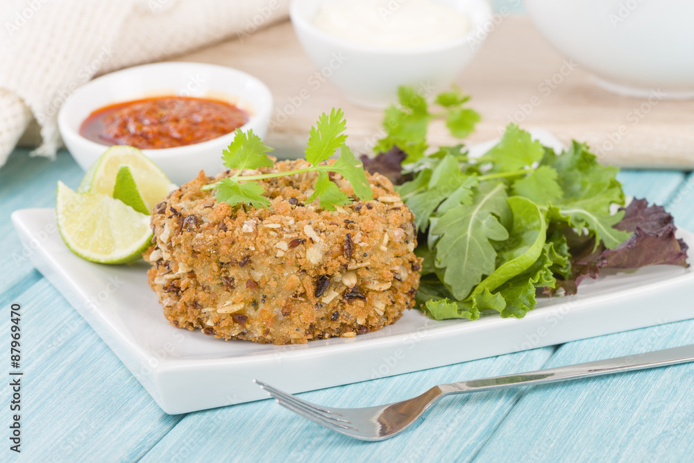 Fishcake - Deep-fried tuna, lime and coriander fishcake served with salad.
Fishcake - Deep-fried tuna, lime and coriander fishcake served with salad.