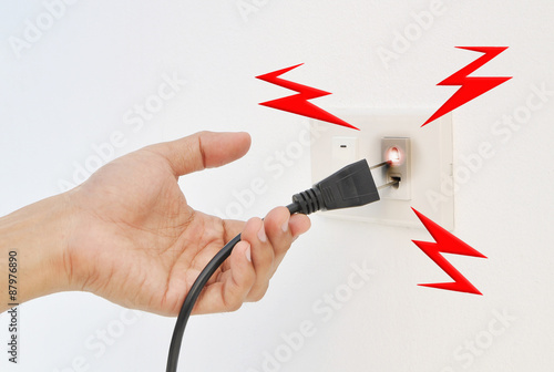 Hand unplug , electric shock