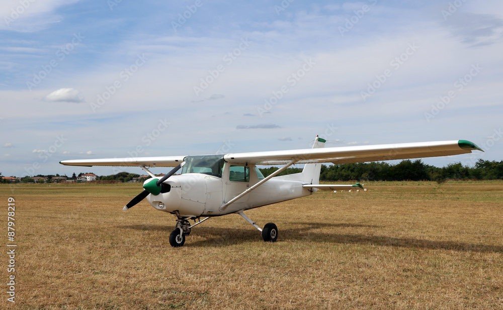 light aircraft at the airport with a propeller light aircraft at the airport with a propeller