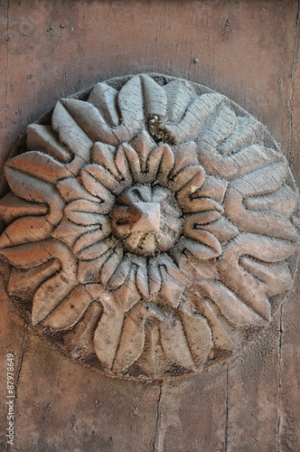 Decorative rosette on the front door in the Italian style