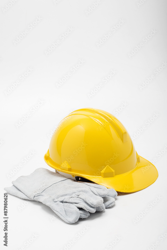 Fototapeta premium construction hat and gloves white backgrund