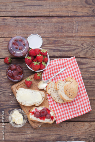 overhead view on healthy breakfast with strawberry jam