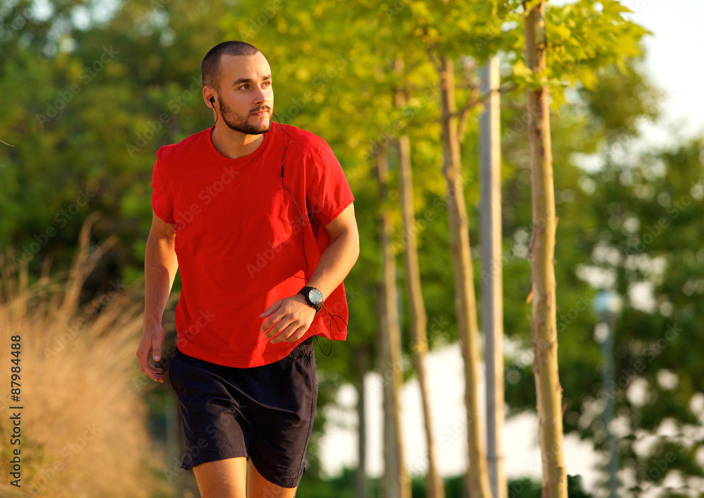 Fototapeta premium Young man exercise running outdoors