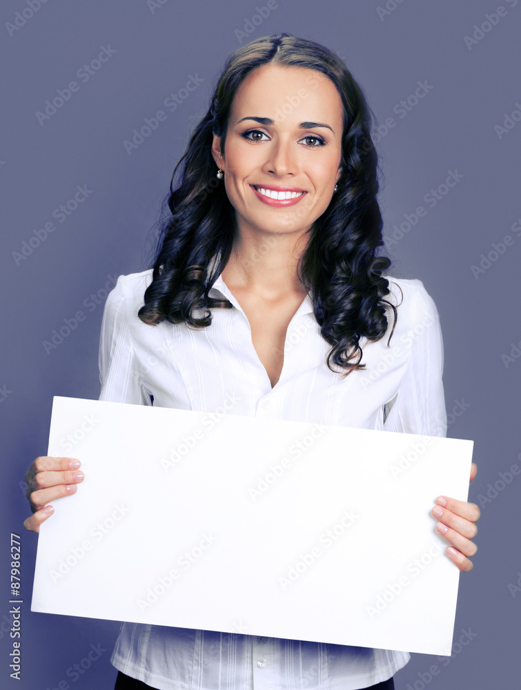 businesswoman showing blank signboard businesswoman showing blank signboard