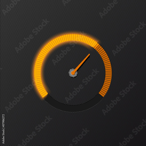 Orange speedometer on carbon background