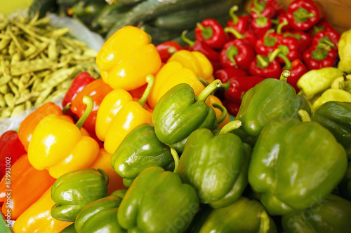 Bunch of peppers/Bunch of various colorful peppers at the market. Food background. Raw and healthy vegetable. Very shallow depth of field for soft background.