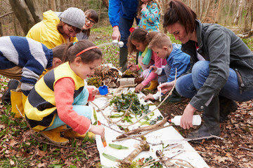 Group Looking For Minibeasts At Activity Centre