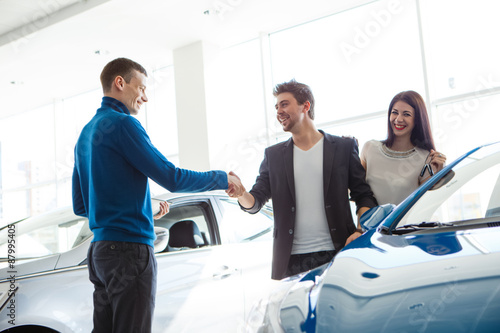 Young couple buys a car
