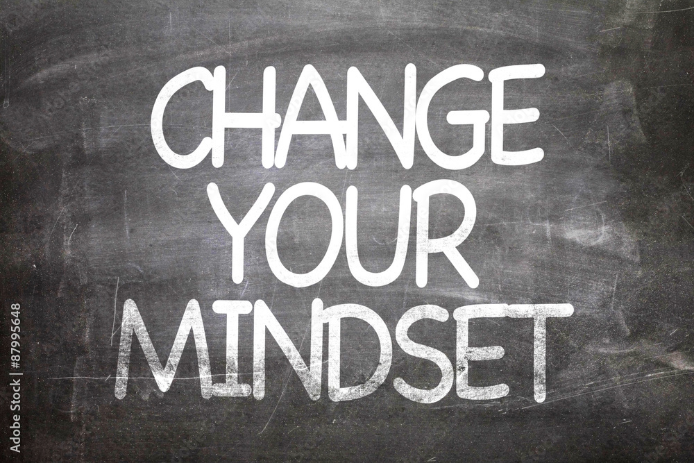 Fototapeta premium Change Your Mindset written on a chalkboard