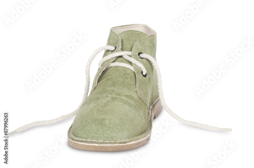 green suede shoe isolated on white