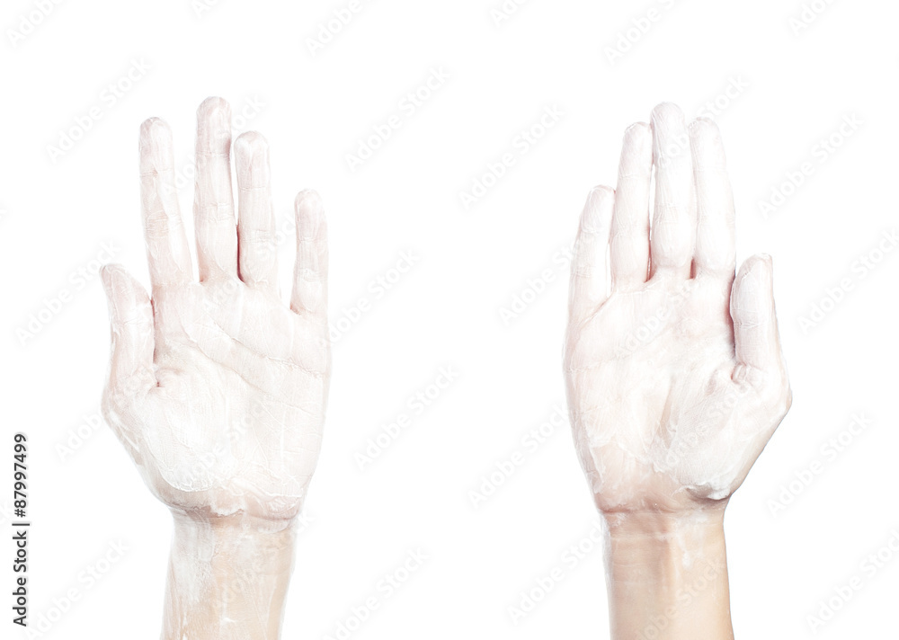 Woman washes her hands. pictured female hands in soapsuds. Isola Woman washes her hands. pictured female hands in soapsuds. Isola