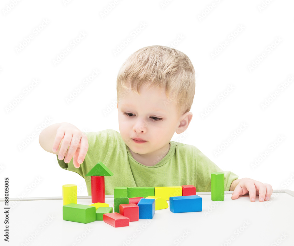 Child Playing Toys Blocks. Isolated White Background. Child Playing Toys Blocks. Isolated White Background.