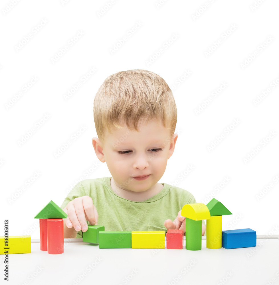 Child Playing Toys Blocks. Isolated White Background. Child Playing Toys Blocks. Isolated White Background.
