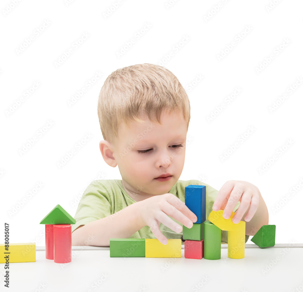 Child Playing Toys Blocks. Isolated White Background. Child Playing Toys Blocks. Isolated White Background.