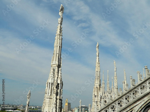 Milan Duomo spires on cloudy day. © sabinalbei