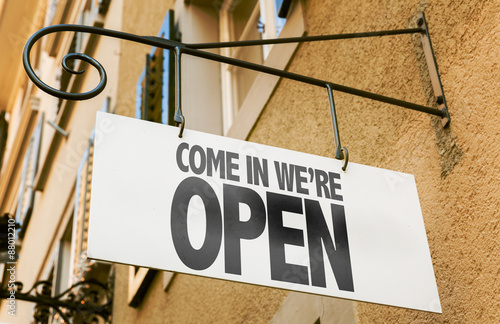 Obraz na plátně Come In We're Open sign in a conceptual image