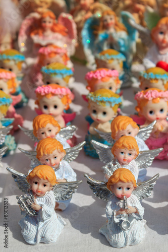 Figurines of angels on a market in Poland