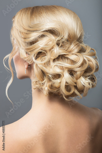 Beautiful woman in image of the bride. Beauty hair. Hairstyle back view