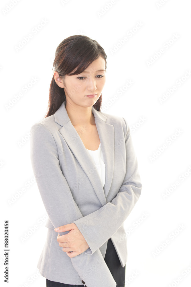 がっかりした表情の女性 がっかりした表情の女性