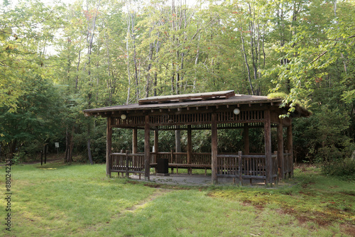 Old wooden cottage in the forest © guide144