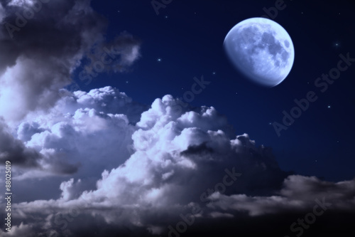 night sky with the moon  clouds and stars